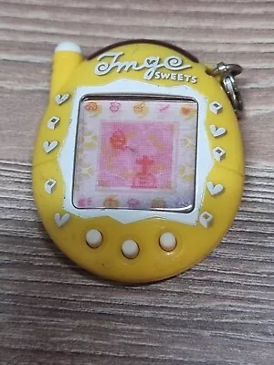 Yellow Sweets Tamagotchi Ketei Akai - Japanese Language V3  • £20