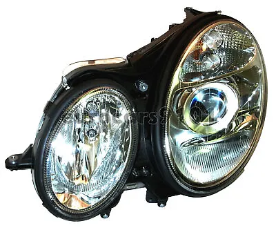 Mercedes W211 XENON HEADLAMP LEFT E320 E500 E55 OEM HELLA 008369451 2118201761 • $554