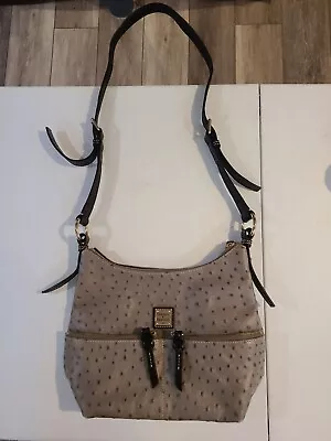 Dooney & Bourke Pebbled Leather Handbag . • $70