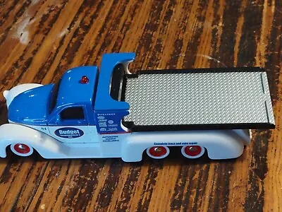 Maisto Missile Tow Flatbed Plastic Diecast Toy  • $25