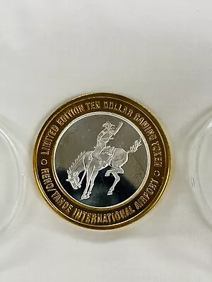 $49 • Buy Reno/Tahoe International Airport $10 Gaming Token .999 Silver- 1996- Cowboy