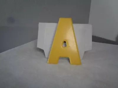 Vintage Metal 7.5  Tall Marquee Letter A Chipped Yellow Paint  • $20