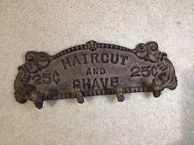 VINTAGE CAST IRON SIGN | HAIRCUT AND SHAVE 25¢ | 4 - Coat Hook | • $69.95