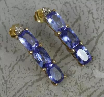 Natural Tanzanite And Diamond 9ct Gold Drop Earrings • £225