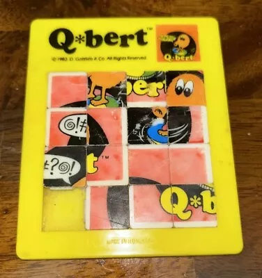 1983 Qbert Sliding Square Puzzle Handheld Plastic American Publishing Vintage • $19.99