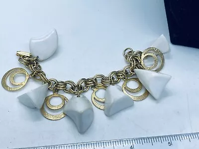 Vtg. Art Deco Style White Carved Lucite & Shiny Gold Tone Charm Bracelet 378 • $0.99