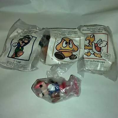 Vintage McDonalds Happy Meal Super Mario Bros Set Of 4 New Worn Open Packages • $16