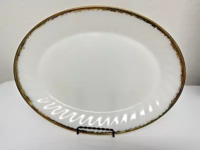 Vintage Fire King Oven Ware White Milk Glass Swirl Oval Serving Platter Gold Rim • $14