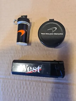 West McLaren Mercedes Re-usable & Disposable Earplugs + MP4-15 Hakkinen Lighter • $18.65