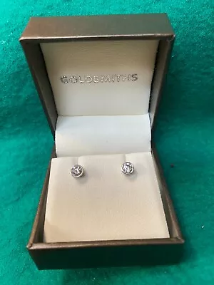 A Pair Of 18ct White Gold Diamond Ear Studs • £225