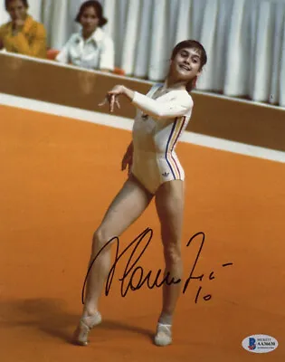 NADIA COMANECI SIGNED 8x10 PHOTO + 10 OLYMPIC GYMNASTICS LEGEND ICON BECKETT BAS • $115