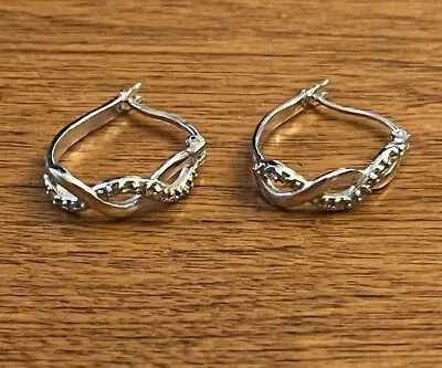 Vintage Sterling Silver Hoop Earrings. • $9.99