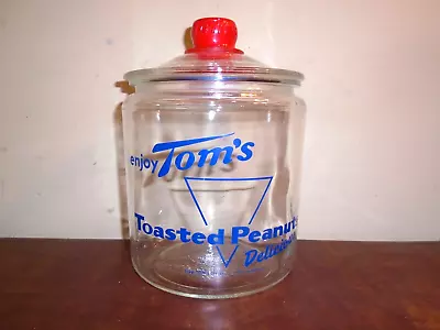 Vintage Tom’s Toasted Peanuts Clear Glass Jar Red Handled Lid Counter Display • $42