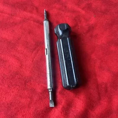 VINTAGE 4-IN-1 SCREWDRIVER BIT TOOL - BLACK HANDLE (k8) • $5