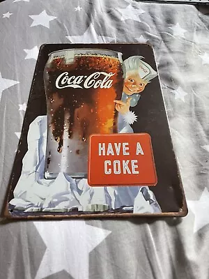 Coca Cola • £1