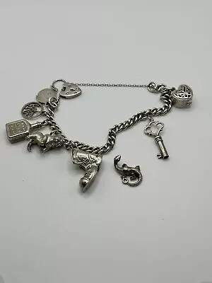 £25 • Buy Heavy Vintage Silver Charm Bracelet With 8 Charms.