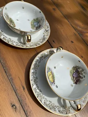 Pair Of Antique Charles Ahrenfeldt Limoges Double-Handled Tea Cups And Saucers • £85