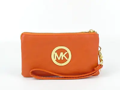 Michael Kors Orange Leather Wristlet • $30