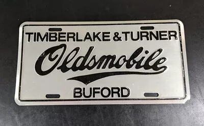 Timberlake & Turner Oldsmobile Dealership Booster License Plate Buford GA 1980s • $35