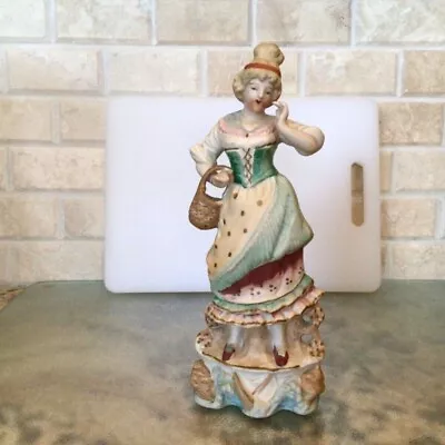 Made In Japan Figurine Of Lady Holding  Basket 9  T 4  W Vintage • $15