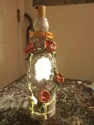 10.5 In. Beautiful Glass Bottle Sculpture With Light  Ounce Apon A Time  • $45