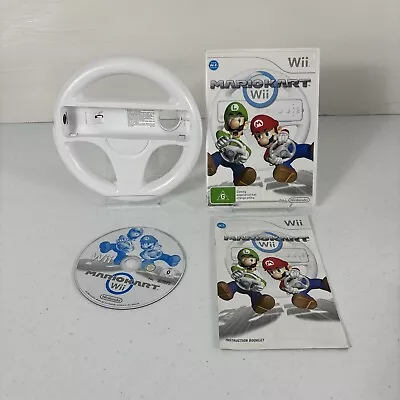 Nintendo Wii Game Mario Kart Wii Complete + Steering Wheel • $24.99