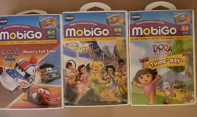 MobiGo VTech Lot & Never Opened Dora Mater's Tall Tales & Disney Fairies Games • $14