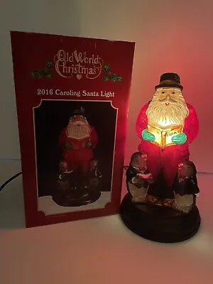 2016 Merck Old World Christmas  Caroling Santa  Figurine W/BOX #529773 • $99.99