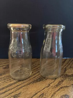 Vintage Half Pint Glass Milk Bottles  1 Meadow Gold Embossed & 1 Unmarked • $15