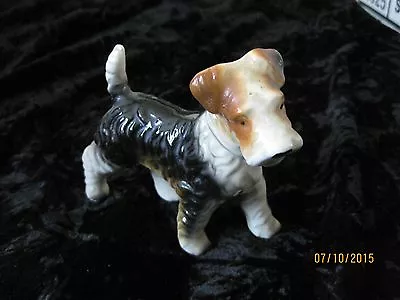 Schnauzer W News In Mouth Porcelain Dog Figurine 3 X4.5  • $12.97