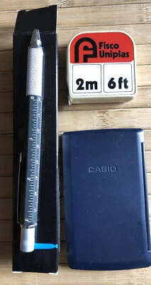 Casio Mini Calculator/Euro Converter; Pen/screwdriver; Fisco Tape Measure • £4