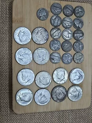 16 War Nickels 12 40% Half Dollars • $1