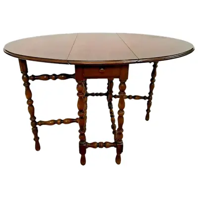 Antique Imperial Gate Leg Table Drop Side Leaf Oval With Long Center Drawer  • $1046.50