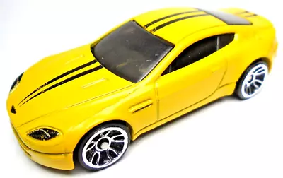 2015 Hot Wheels Aston Martin V8 Vantage Yellow 1:64 Diecast 2 3/4  Car W/ Black • $10.99