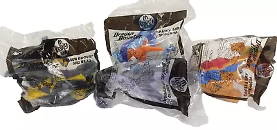 4 X McDonalds Happy Meal Dragon Booster Toys • $39.99