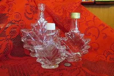 Lot Of 3 Vintage Collectible Empty Maple Leaf Shaped Figural Glass Bottles  • $31.49