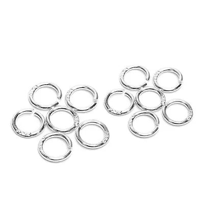 STERLING SILVER- 12 X 7MM JUMP RINGS PERFECT FOR CHARMS • £6.99