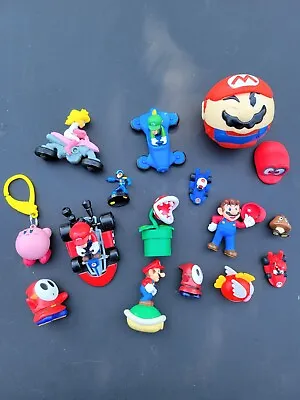 Mario Bros / Nintendo 16 Piece Lot Figures Mario Luigi Megaman Kirby  • $18