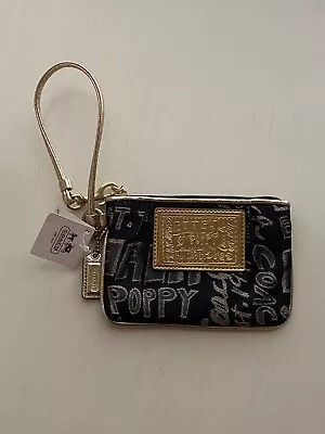 $32 • Buy Coach Poppy Story Patch Black Gold Wristlet 44070 New
