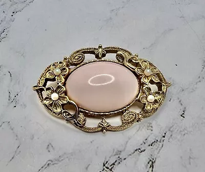 Vintage 1928 Jewelry Gold Tone Pin Brooch Angel Skin Pink Lucite Cabochon • $9.99