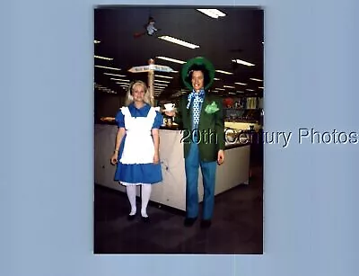 Found Color Photo P+0998 Man And Woman Posed In Alice In Wonderland Costumes • £6.74