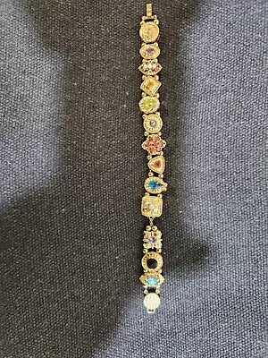 Vintage 14kt Gold Slide Bracelet With 13 Slide Charms & 28 Round Bead Spacers. • $5000