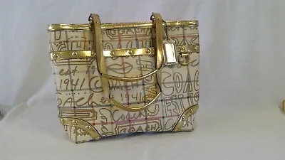 Coach Gold Graffiti Purse • $50