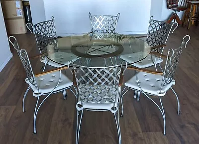 Cast Iron And Glass Round Dining Table And Chairs Used. Great Condition • $50