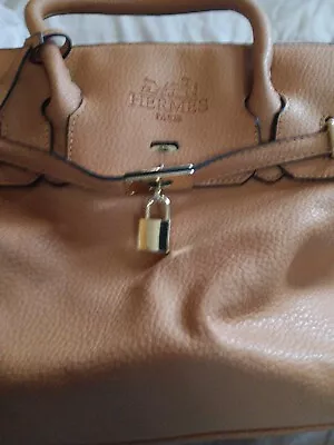 Large  Tan Hermes Paris Bag In Used Condition  • $800