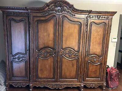 French Louis XVI Period Mahogany Armoire • $1000