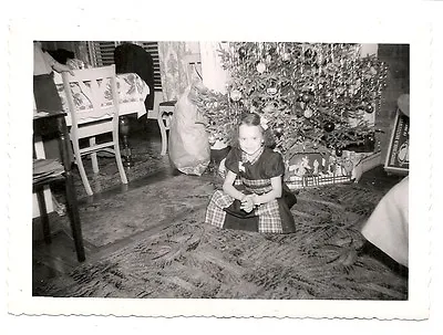 Great Vintage Christmas Snapshot Young Girl Sitting In Front Of Christmas Tree • $4.99