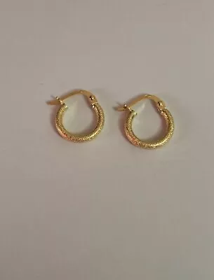 Gold Hoop Earrings • £90