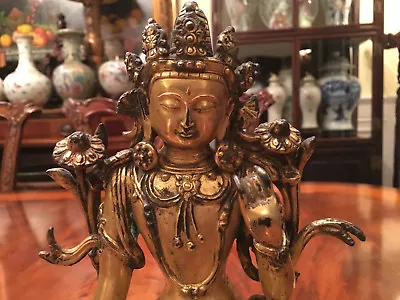 A Chinese Qing Dynasty Gilt Bronze Guanyin Statue Marked.  • $7500