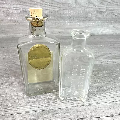Lot Of 2 Vtg Clear Bottles Long Server The Good Cough Syrup &Reproduced Maurine • $16.31